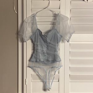 Excellent condition size Medium. Body suit.